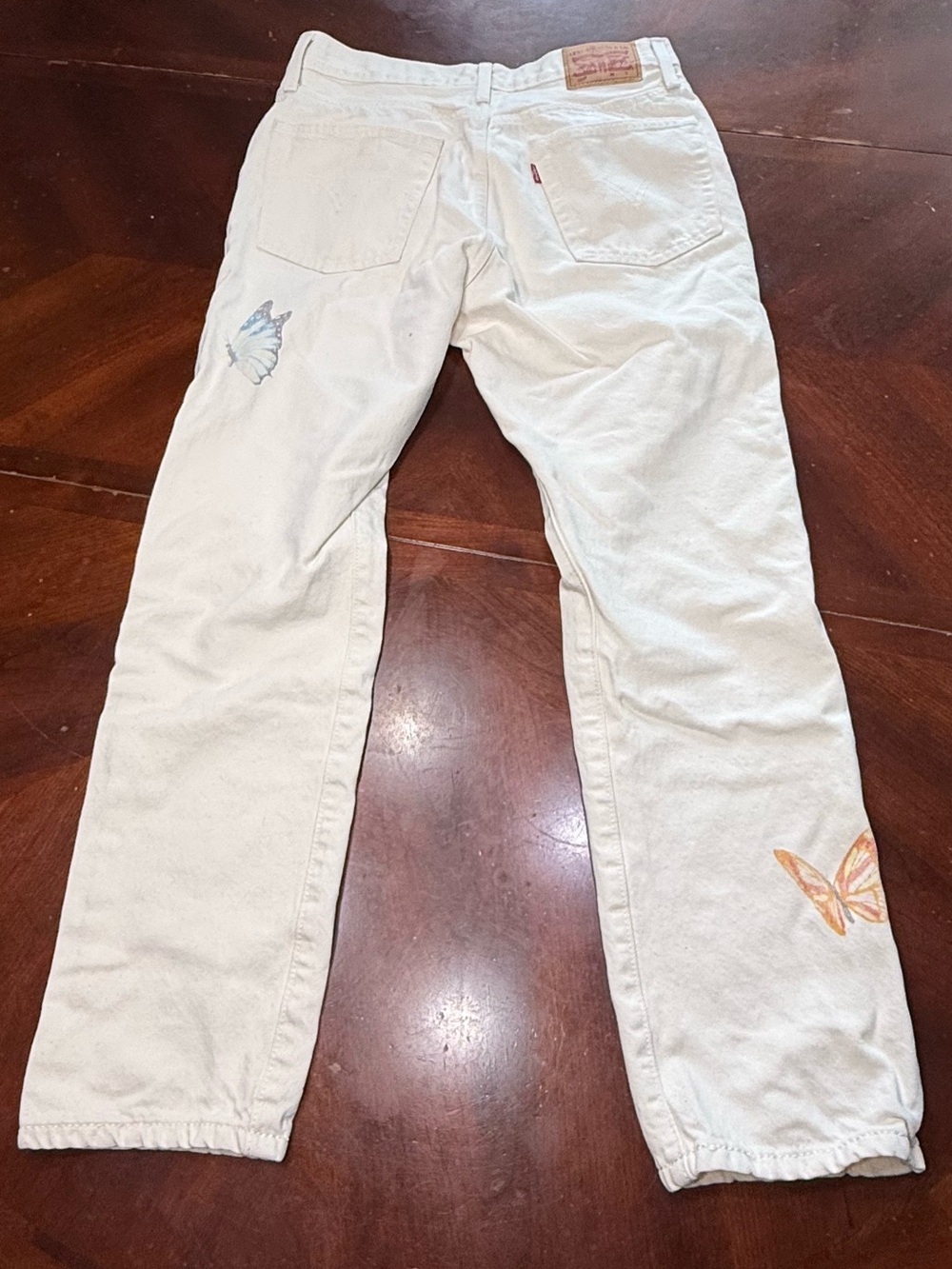 White Denim Jeans with Butterfly Accents
